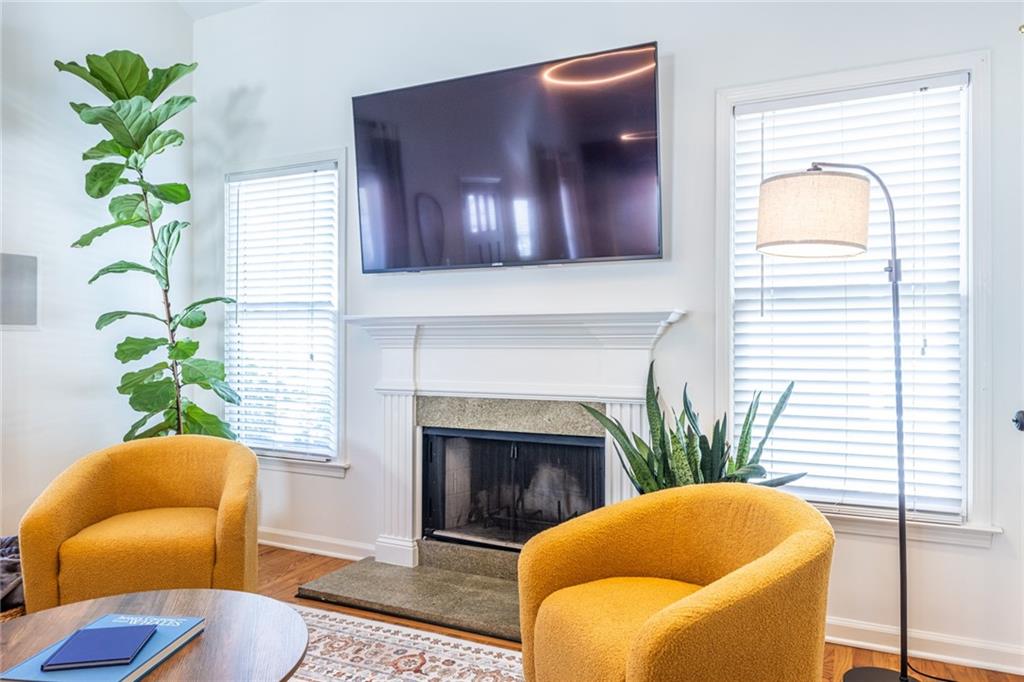 69 Randolph Street Northeast, Unit A Atlanta, GA 30312 - Photo 12 of 50 a living room with furniture and a potted plant