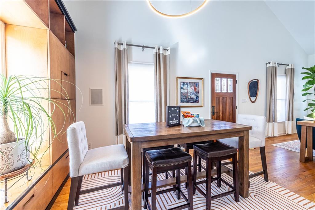 69 Randolph Street Northeast, Unit A Atlanta, GA 30312 - Photo 16 of 50 a dining room with furniture and wooden floor