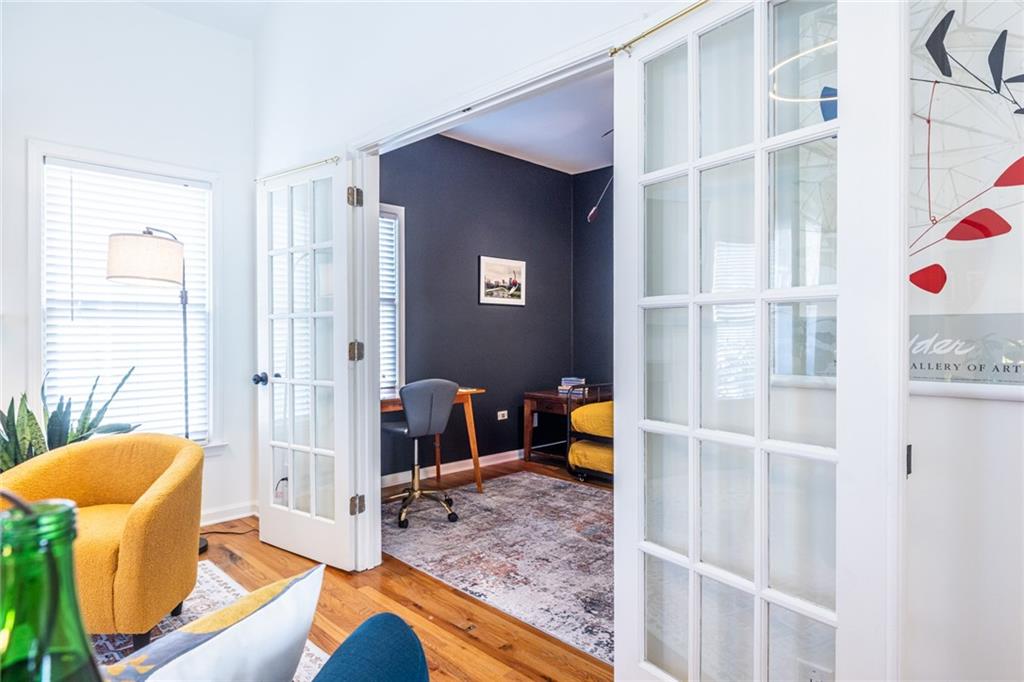 69 Randolph Street Northeast, Unit A Atlanta, GA 30312 - Photo 25 of 50 a living room with furniture and a window