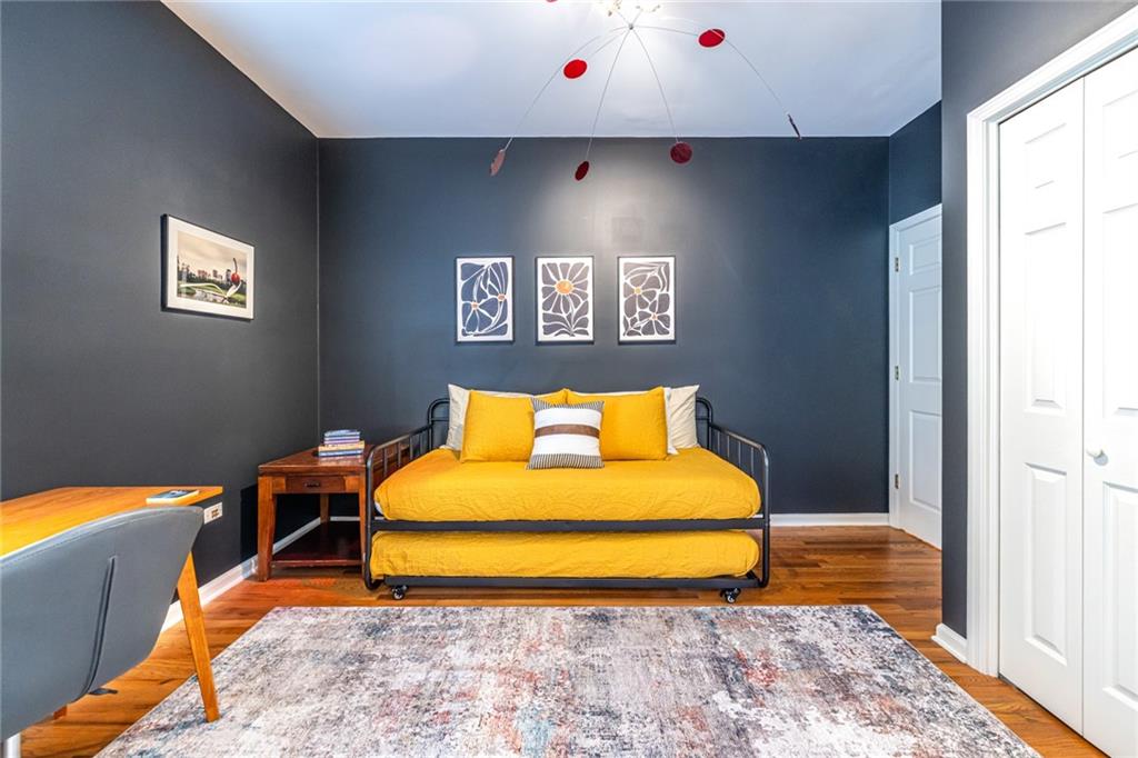 69 Randolph Street Northeast, Unit A Atlanta, GA 30312 - Photo 26 of 50 a room with a bed and a window