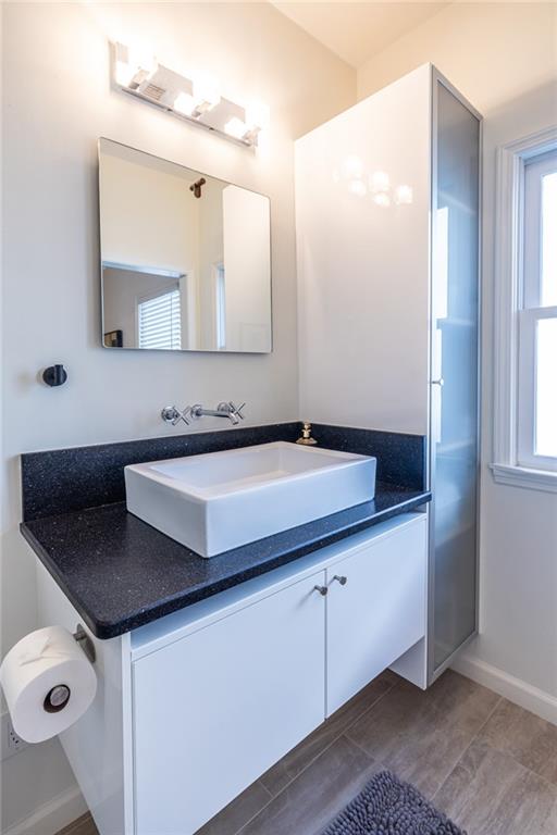 69 Randolph Street Northeast, Unit A Atlanta, GA 30312 - Photo 45 of 50 a bathroom with a sink and a mirror