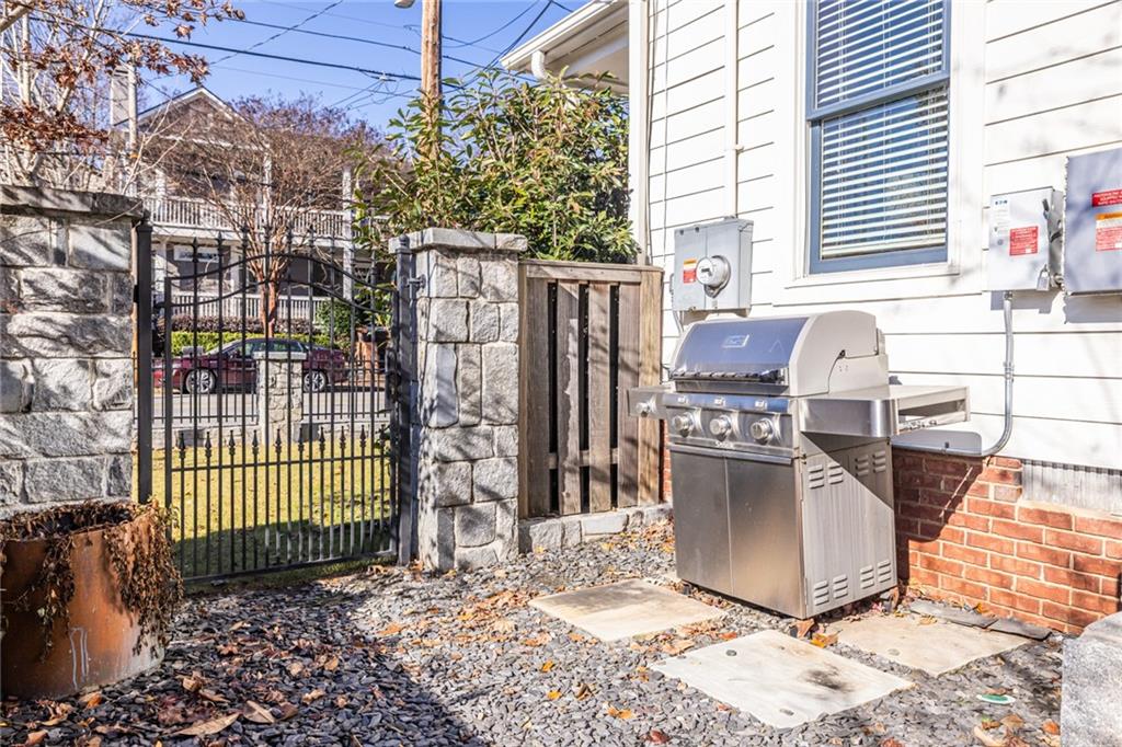 69 Randolph Street Northeast, Unit A Atlanta, GA 30312 - Photo 49 of 50 a view of a porch with a table and chairs