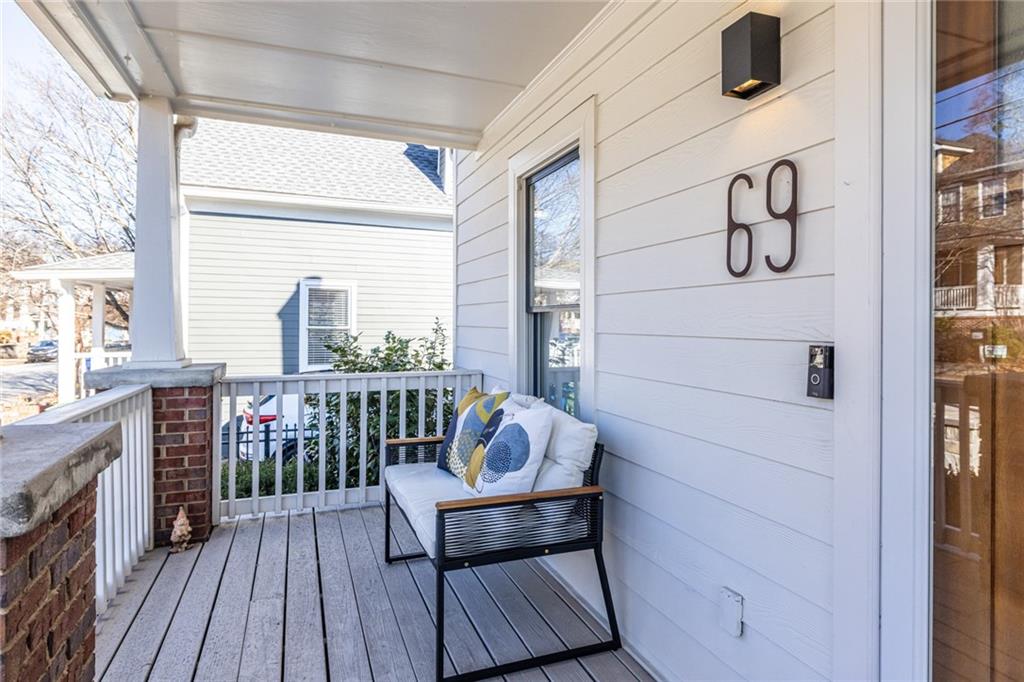 69 Randolph Street Northeast, Unit A Atlanta, GA 30312 - Photo 6 of 50 a view of a balcony with wooden chairs