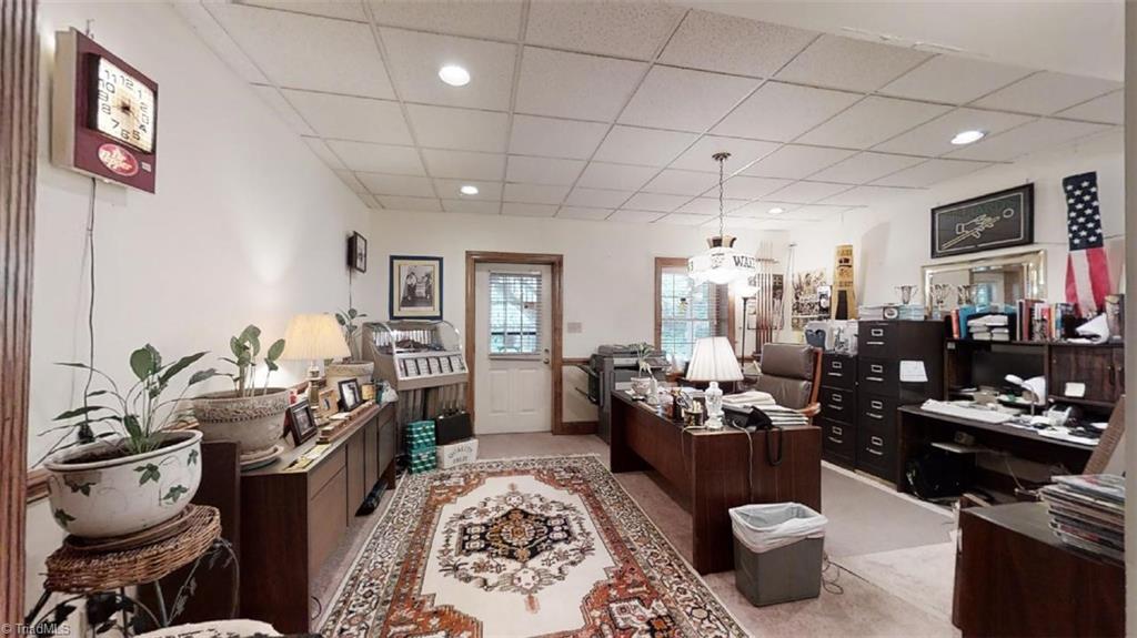 516 Barrett Road Winston-Salem, NC 27104 - Photo 22 of 25 Office area / game room on lower level. Access to covered patio and backyard.
