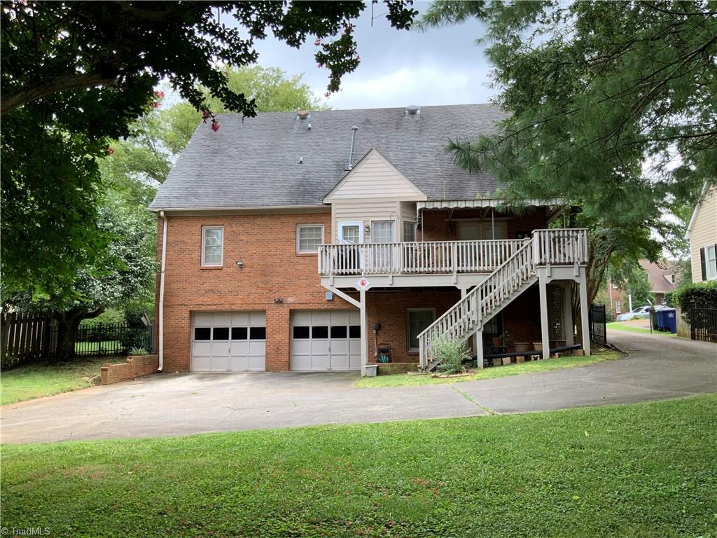 516 Barrett Road Winston-Salem, NC 27104 - Photo 24 of 25 The covered deck off the main level or the patio area under the deck off the lower level provide relaxing getaways.