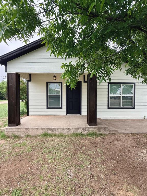 610 5th Street Hawley, TX 79525 - Photo 18 of 19 a house with trees in the background