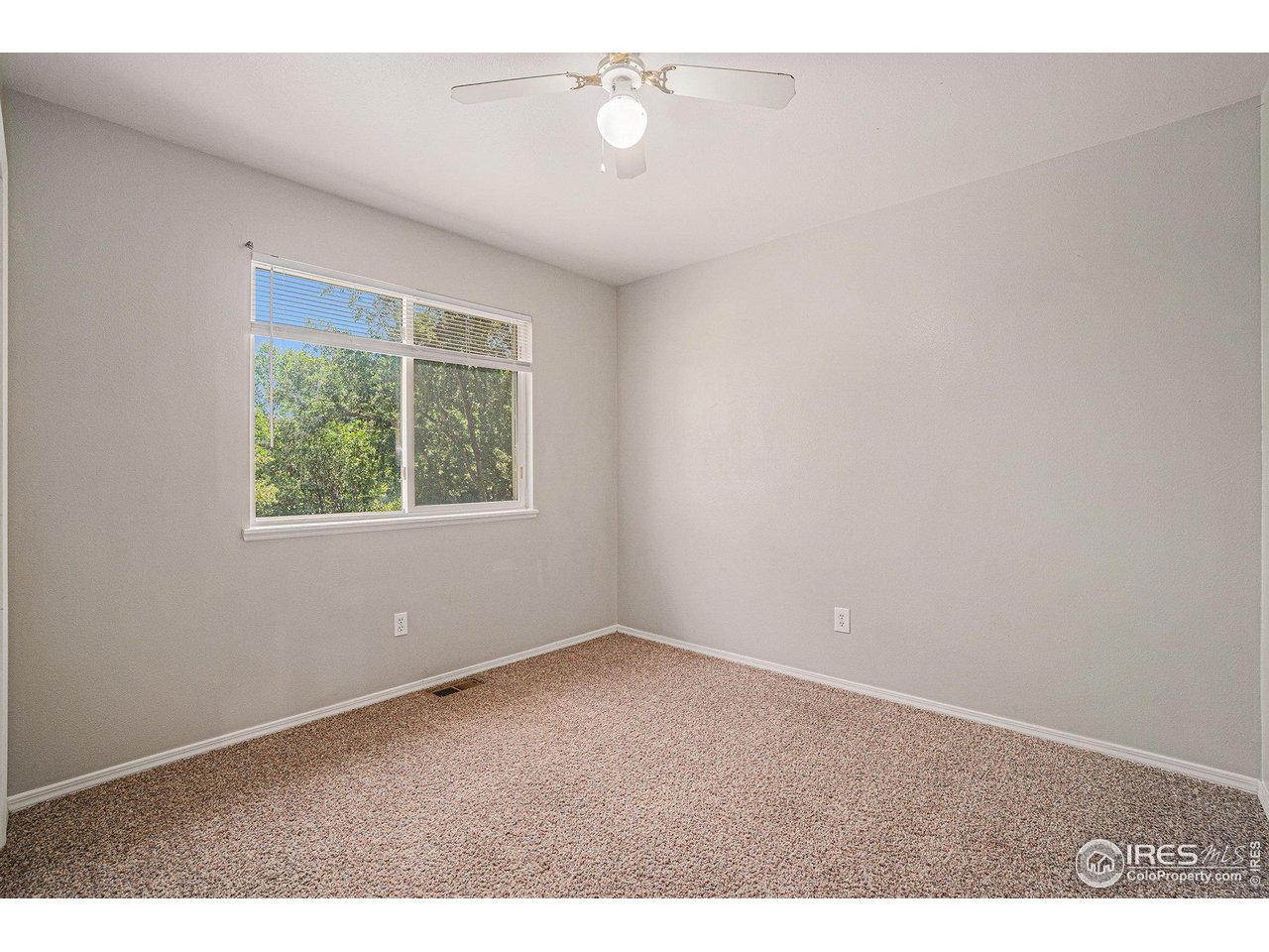 1634 San Juan Circle Evans, CO 80620 - Photo 11 of 20 an empty room with a window