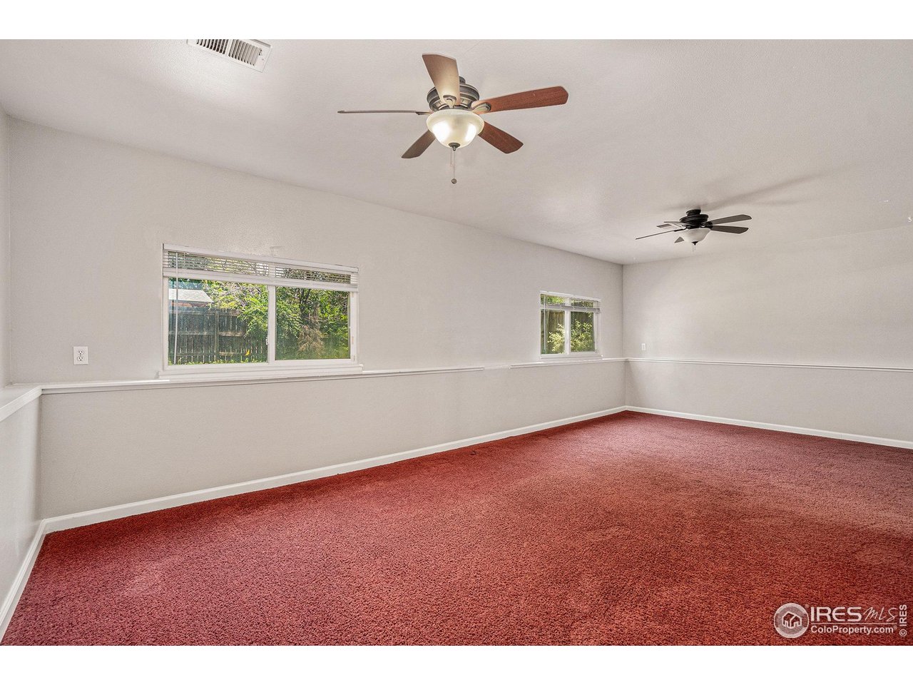 1634 San Juan Circle Evans, CO 80620 - Photo 15 of 20 a view of an empty room with a window