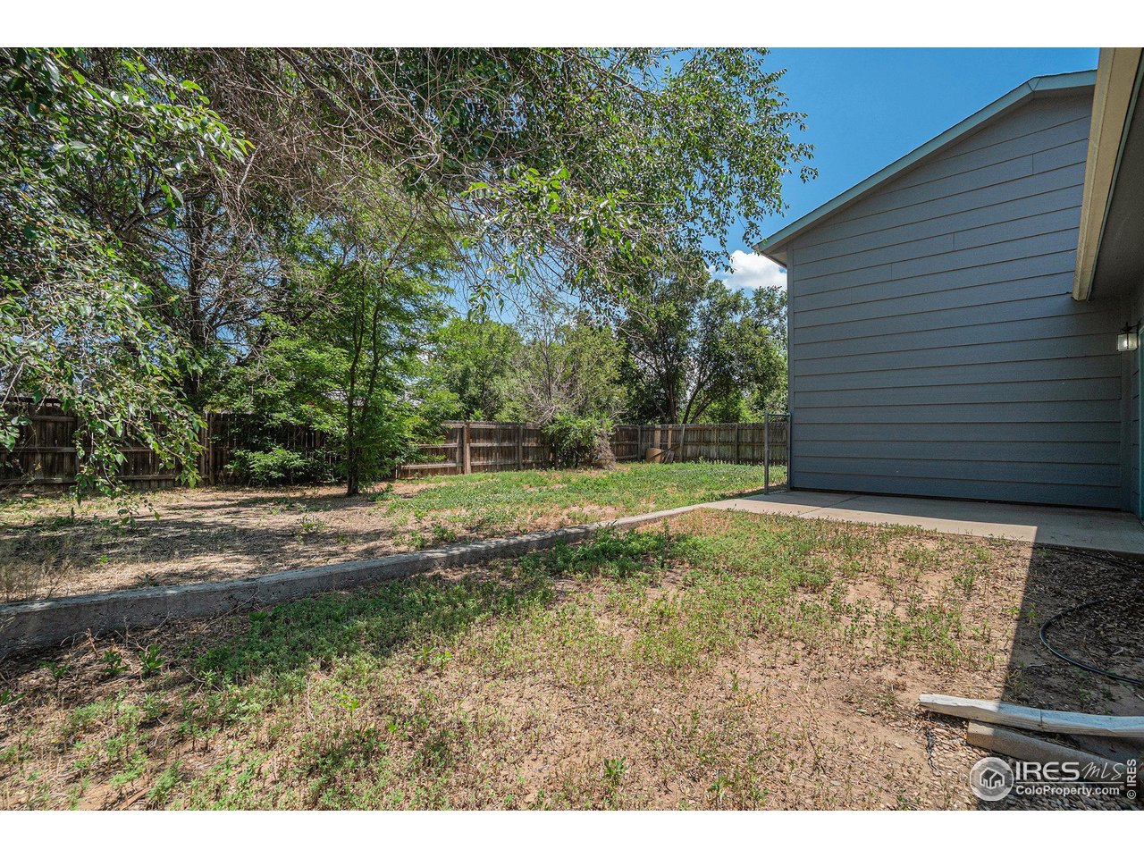 1634 San Juan Circle Evans, CO 80620 - Photo 19 of 20 a view of a backyard