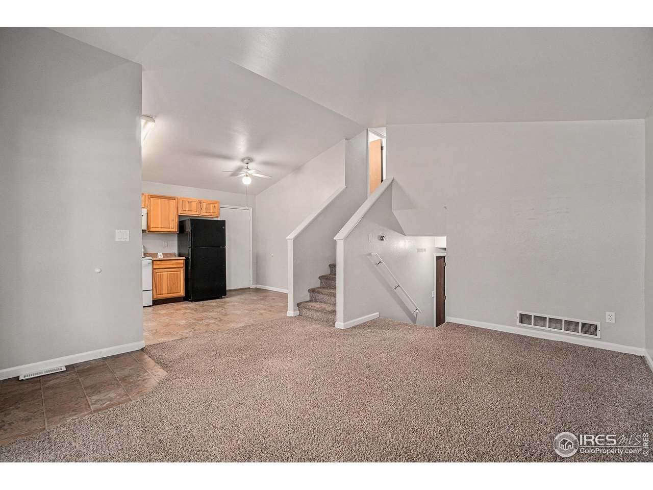 1634 San Juan Circle Evans, CO 80620 - Photo 2 of 20 a view of an empty room with a window