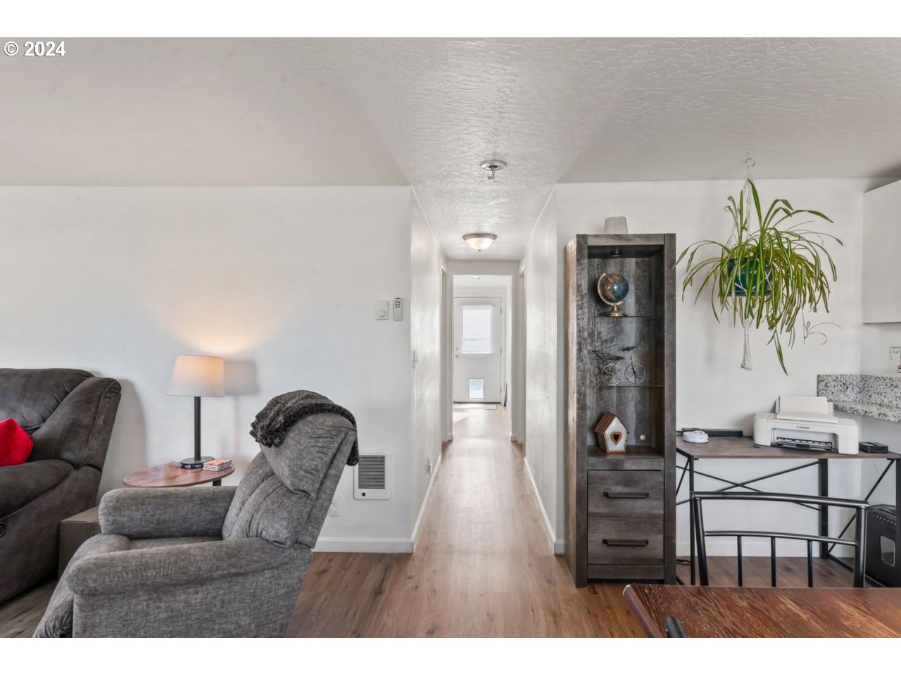 1147 33rd Street Springfield, OR 97478 - Photo 2 of 44 a living room with furniture and a potted plant