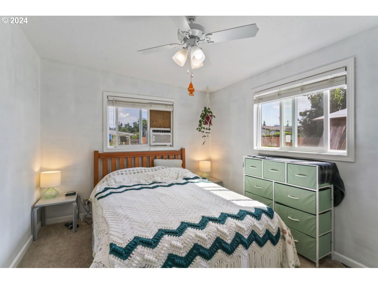 1147 33rd Street Springfield, OR 97478 - Photo 21 of 44 a bedroom with a bed and a window