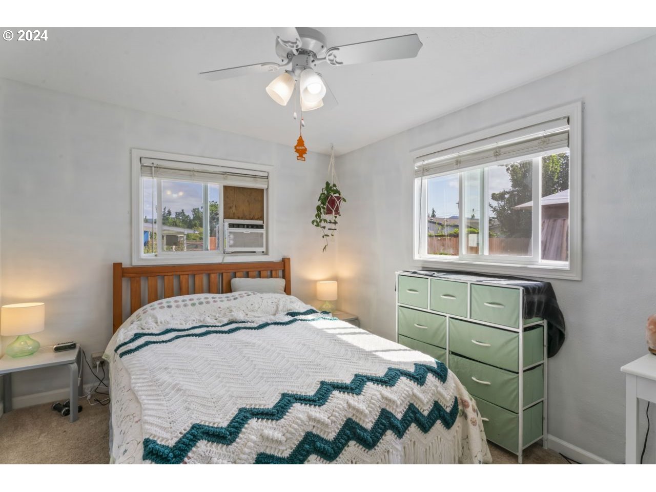 1147 33rd Street Springfield, OR 97478 - Photo 22 of 44 a bedroom with a bed and a window