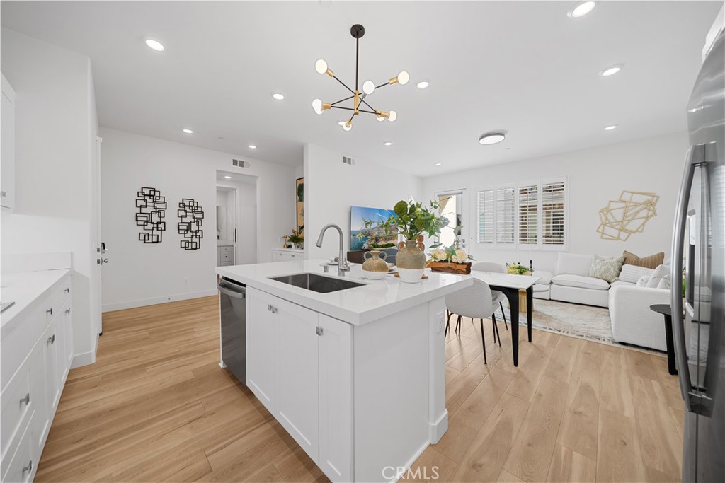 a kitchen with a stove and a table