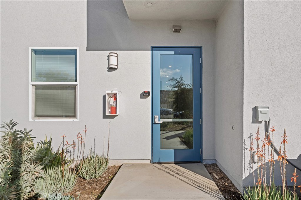 163 Baluster Irvine, CA 92618 - Photo 22 of 32 a view of hallway with livingroom