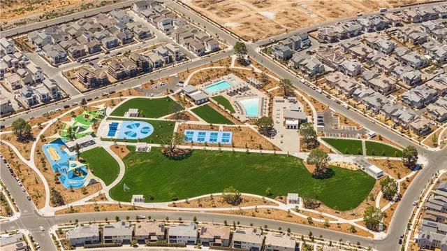 view of an swimming pool with a yard