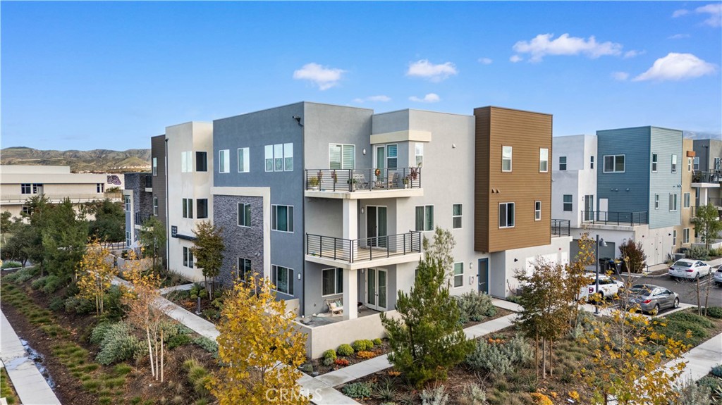 163 Baluster Irvine, CA 92618 - Photo 4 of 32 a view of a house with a yard