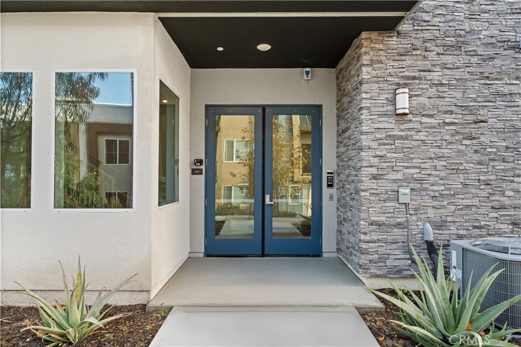 163 Baluster Irvine, CA 92618 - Photo 7 of 32 a view of entryway with a yard