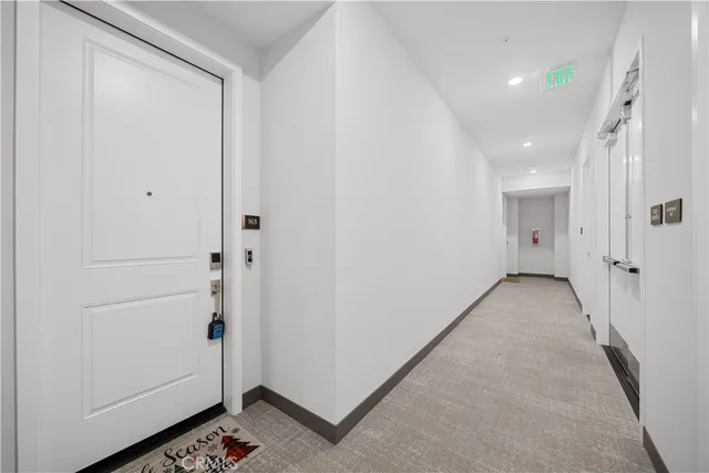 a view of hallway with livingroom