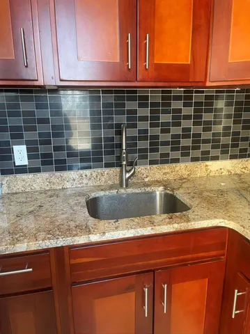 a view of a sink and dishwasher