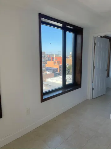 an empty room with window