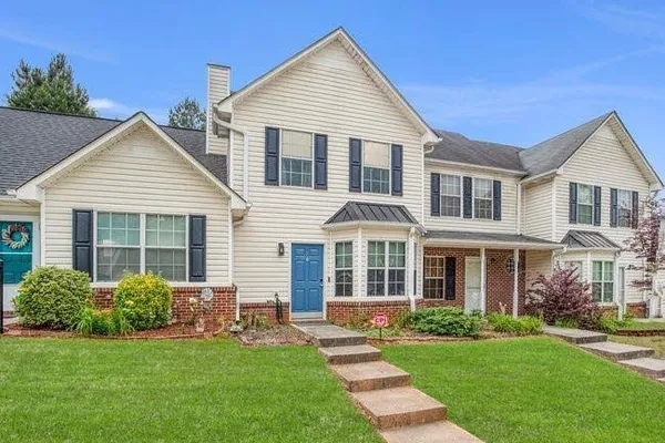 front view of a house and a yard