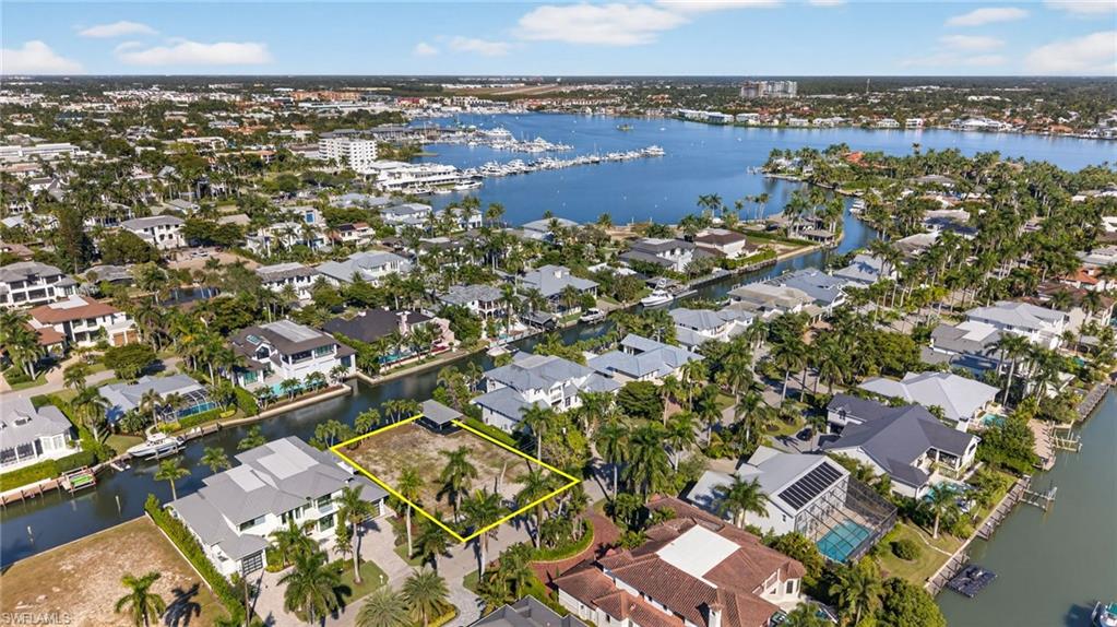601 17th Avenue South Naples, FL 34102 - Photo 12 of 16 an aerial view of a city