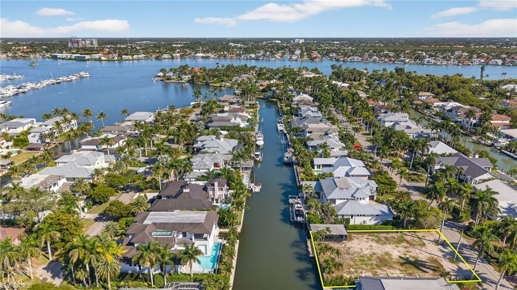 601 17th Avenue South Naples, FL 34102 - Photo 13 of 16 an aerial view of a city