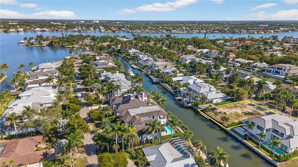 601 17th Avenue South Naples, FL 34102 - Photo 14 of 16 an aerial view of residential houses with outdoor space