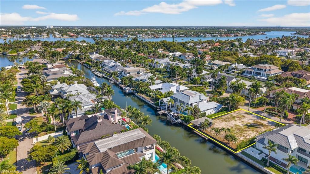 601 17th Avenue South Naples, FL 34102 - Photo 15 of 16 an aerial view of residential houses with outdoor space and river