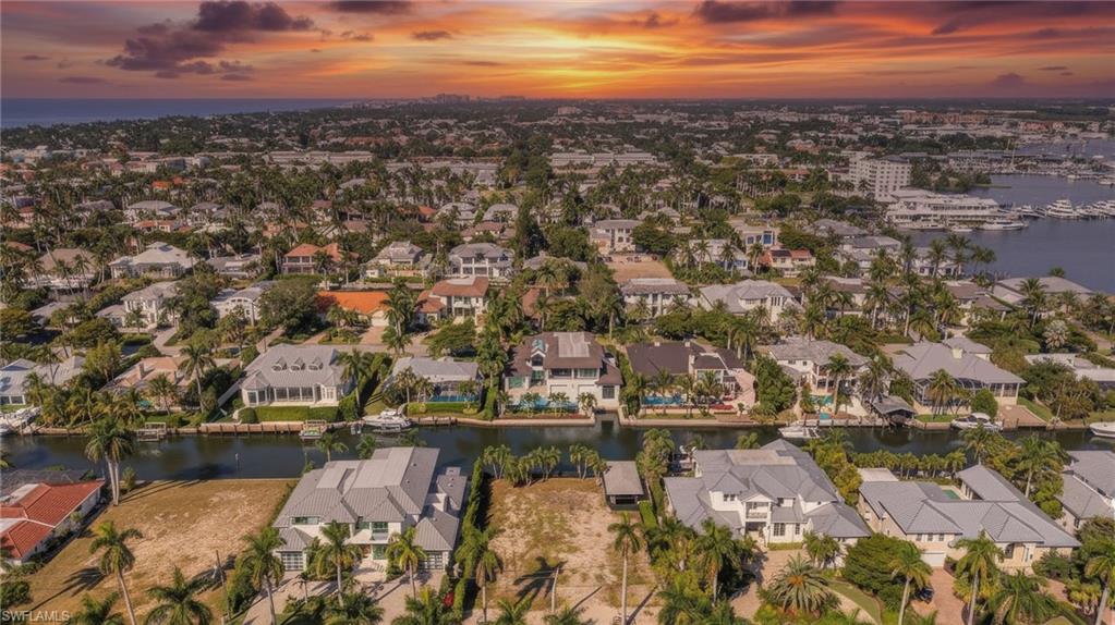 601 17th Avenue South Naples, FL 34102 - Photo 3 of 16 an aerial view of residential houses with outdoor space