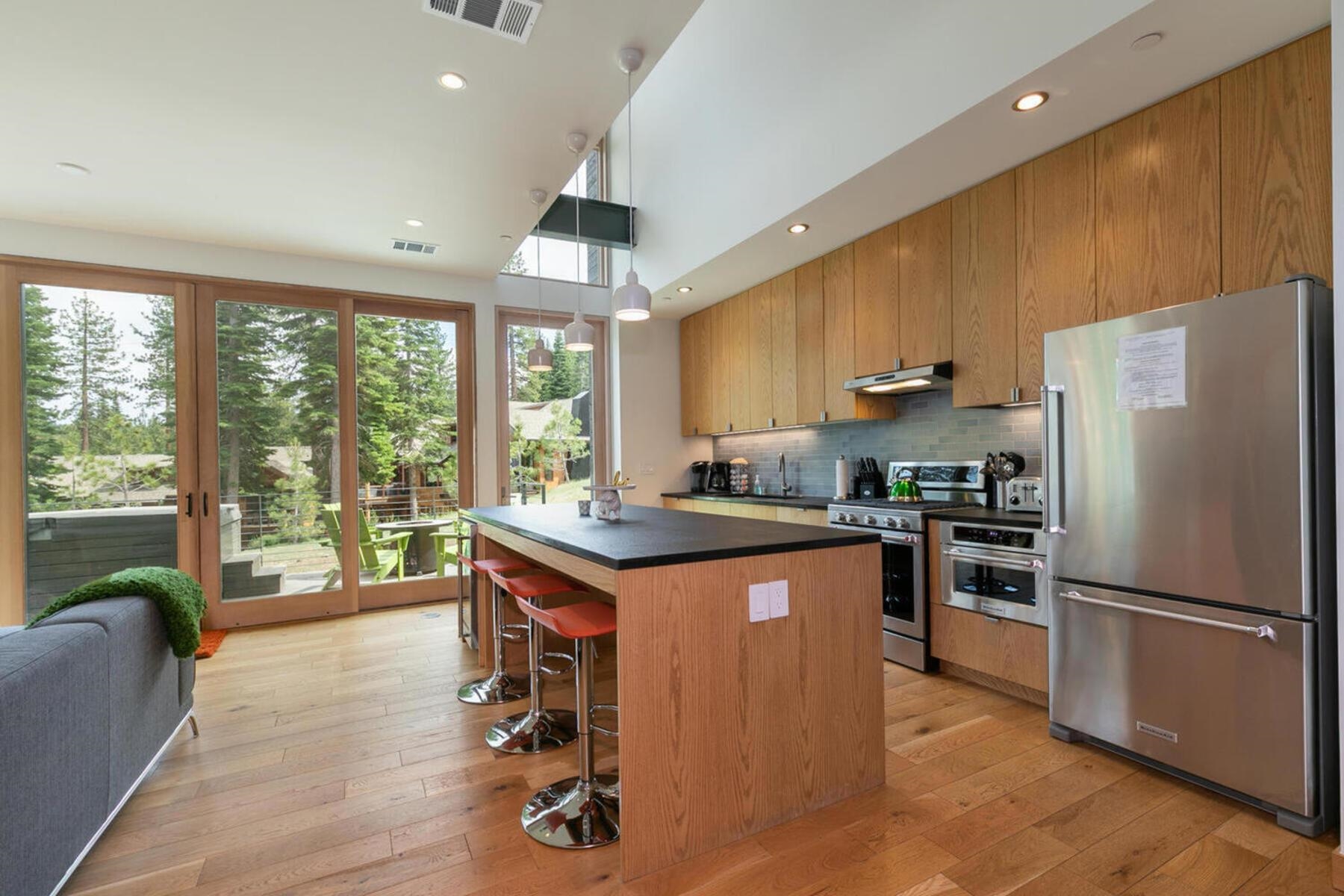 15004 Peak View Place Truckee, CA 96161 - Photo 13 of 21 a kitchen with a stove a refrigerator and a view of living room