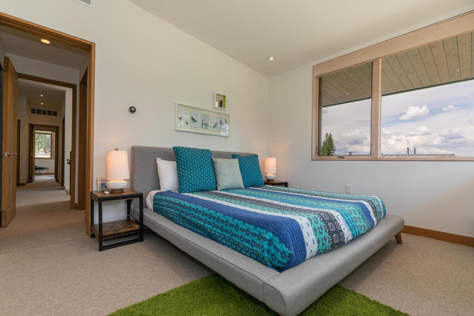 15004 Peak View Place Truckee, CA 96161 - Photo 16 of 21 a bed sitting in a bedroom next to a window