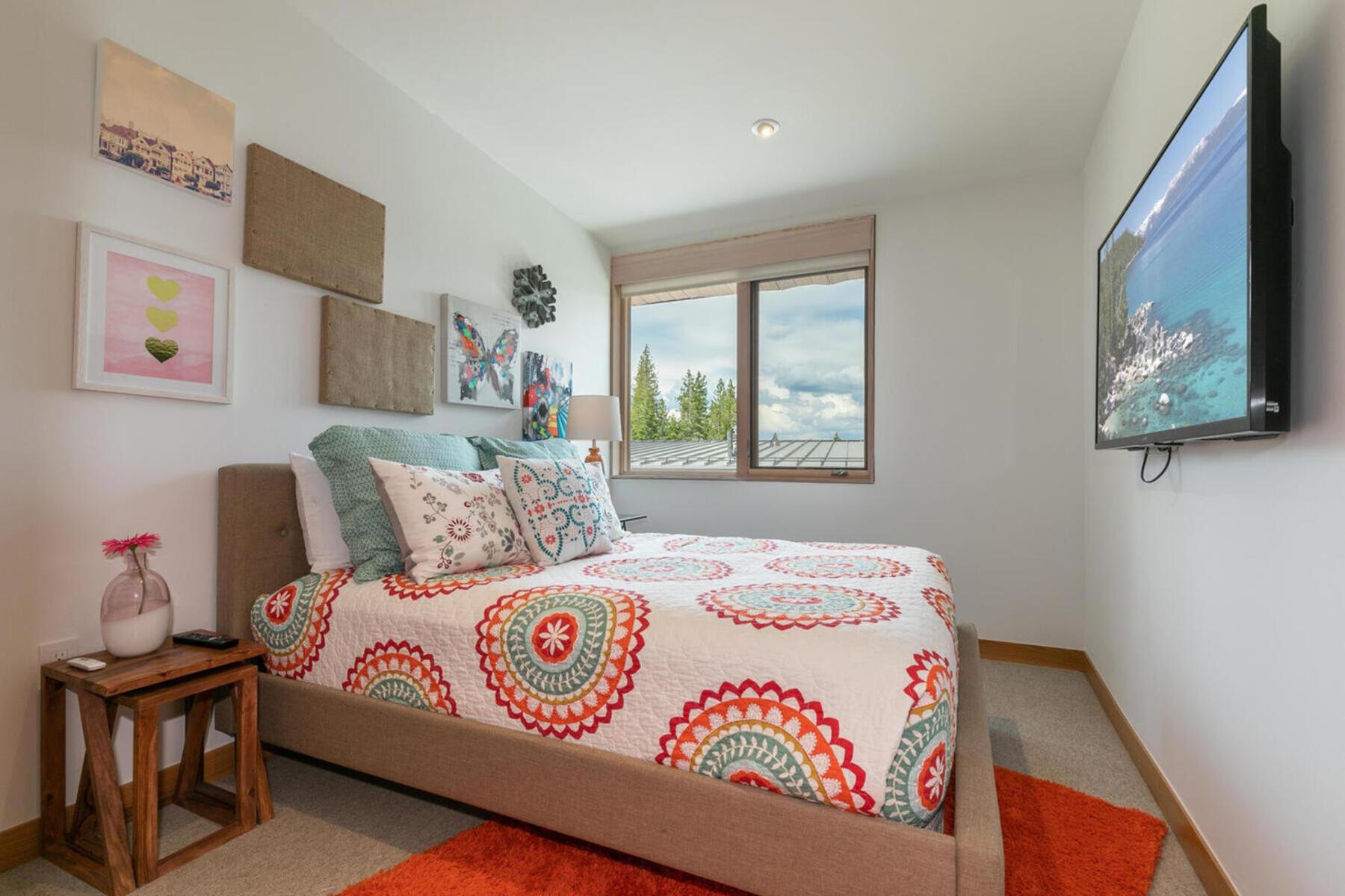 15004 Peak View Place Truckee, CA 96161 - Photo 18 of 21 a bedroom with a bed a painting on the wall and a window