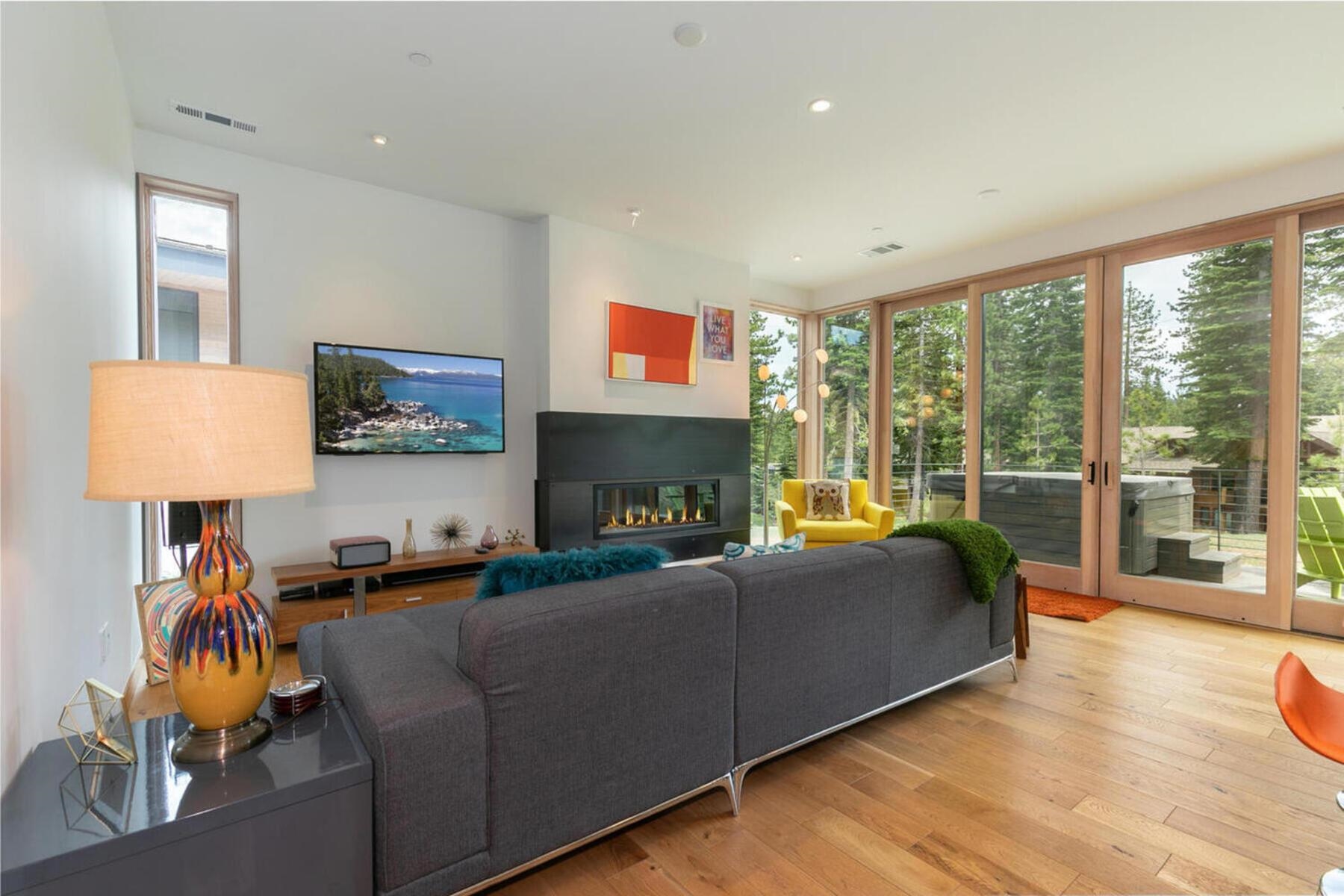 15004 Peak View Place Truckee, CA 96161 - Photo 6 of 21 a living room with furniture and a flat screen tv