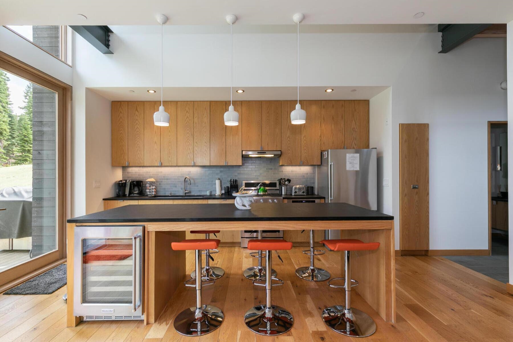 15004 Peak View Place Truckee, CA 96161 - Photo 7 of 21 a kitchen with stainless steel appliances granite countertop a sink and cabinets