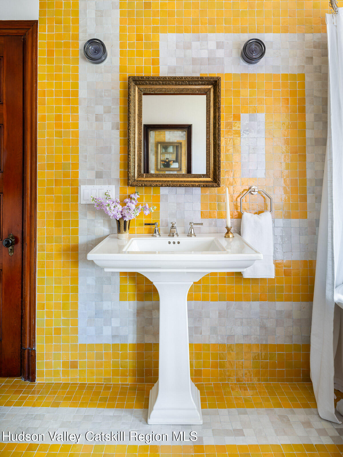 164 Grand Street Newburgh, NY 12550 - Photo 33 of 59 a bathroom with a tub sink and mirror