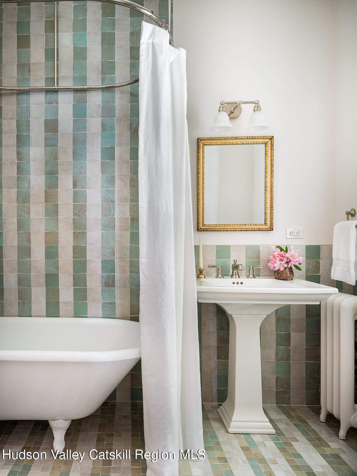 164 Grand Street Newburgh, NY 12550 - Photo 43 of 59 a bathroom with a bathtub and a sink
