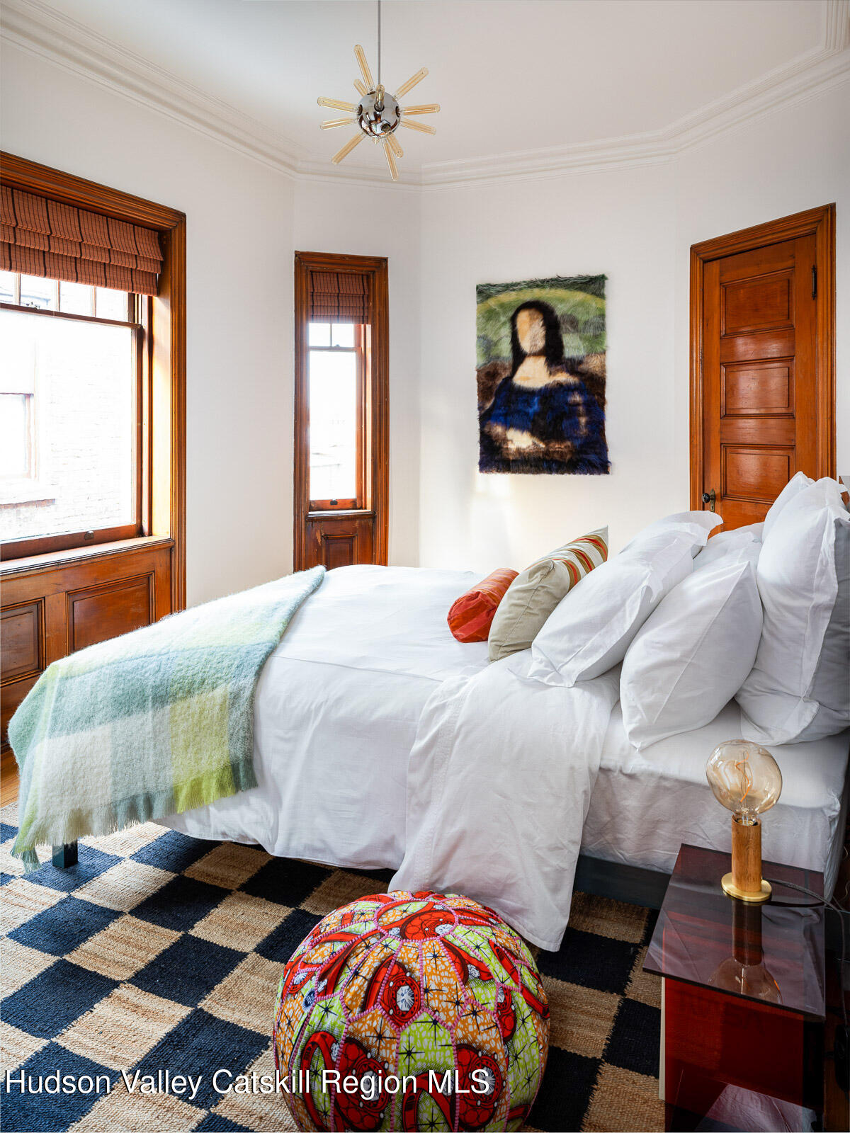 164 Grand Street Newburgh, NY 12550 - Photo 46 of 59 a bedroom with a bed and window