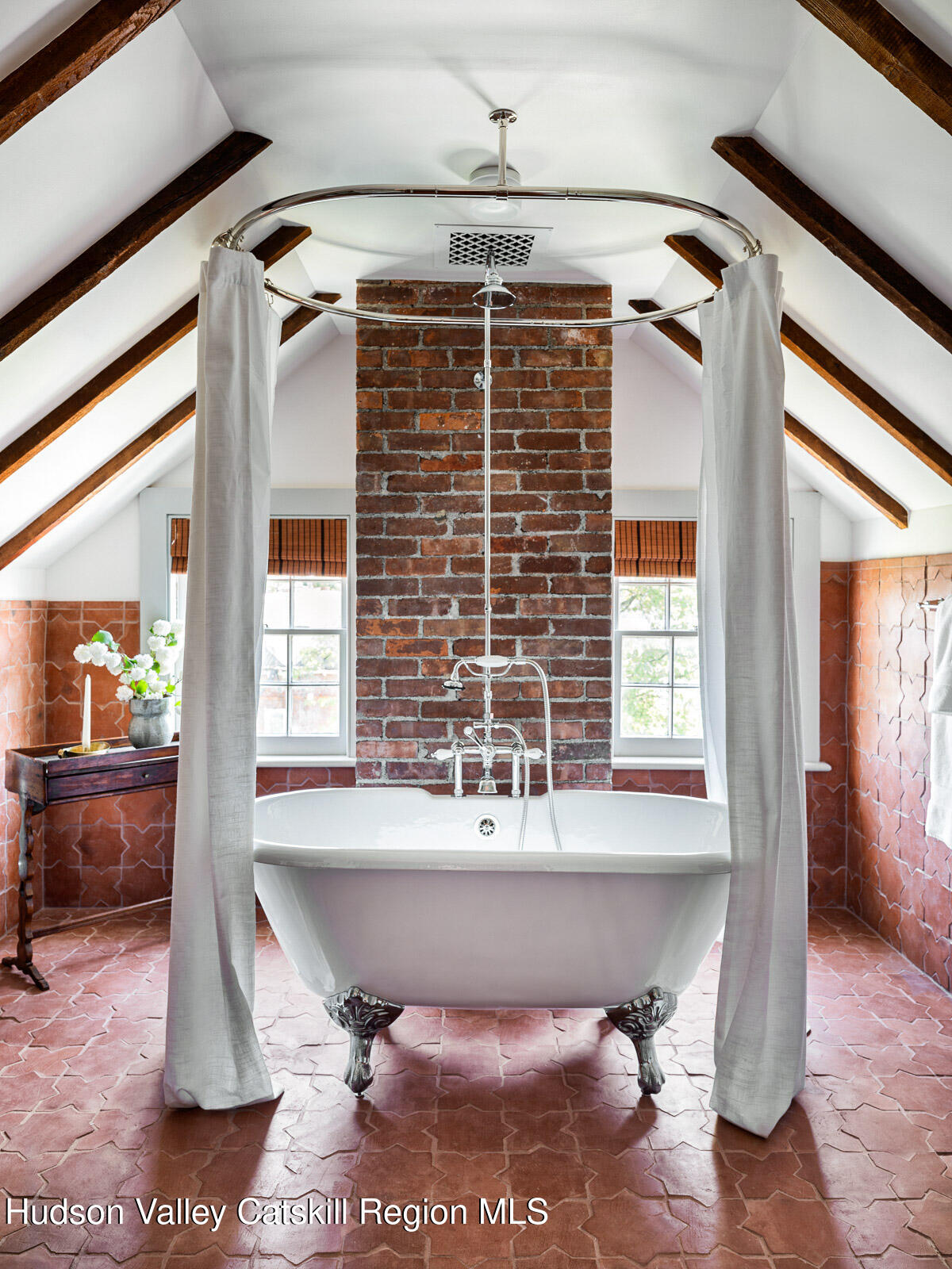 164 Grand Street Newburgh, NY 12550 - Photo 47 of 59 a bath tub sitting in a bathroom next to a window
