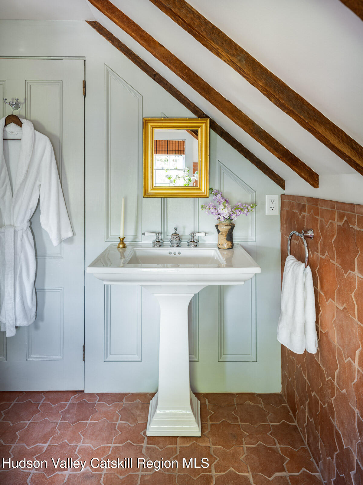 164 Grand Street Newburgh, NY 12550 - Photo 49 of 59 a bathroom with a sink and a mirror