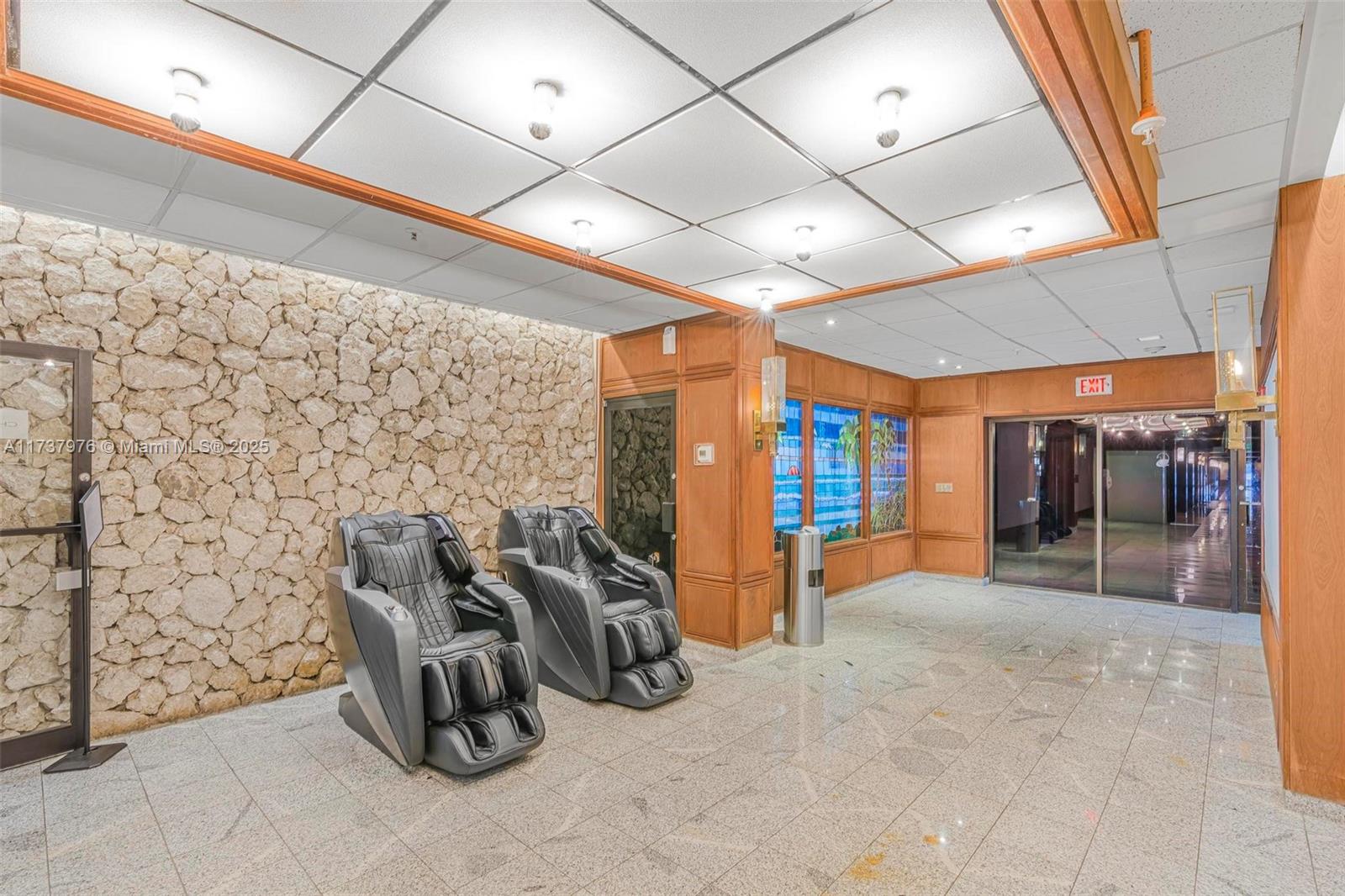 600 Northeast 36th Street, Unit 414 Miami, FL 33137 - Photo 39 of 51 a view of a room with gym equipment