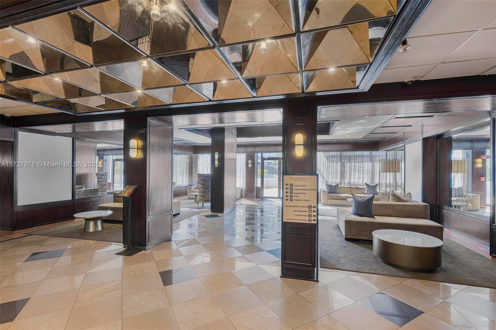 600 Northeast 36th Street, Unit 414 Miami, FL 33137 - Photo 41 of 51 a view of a lobby with furniture and floor to ceiling window