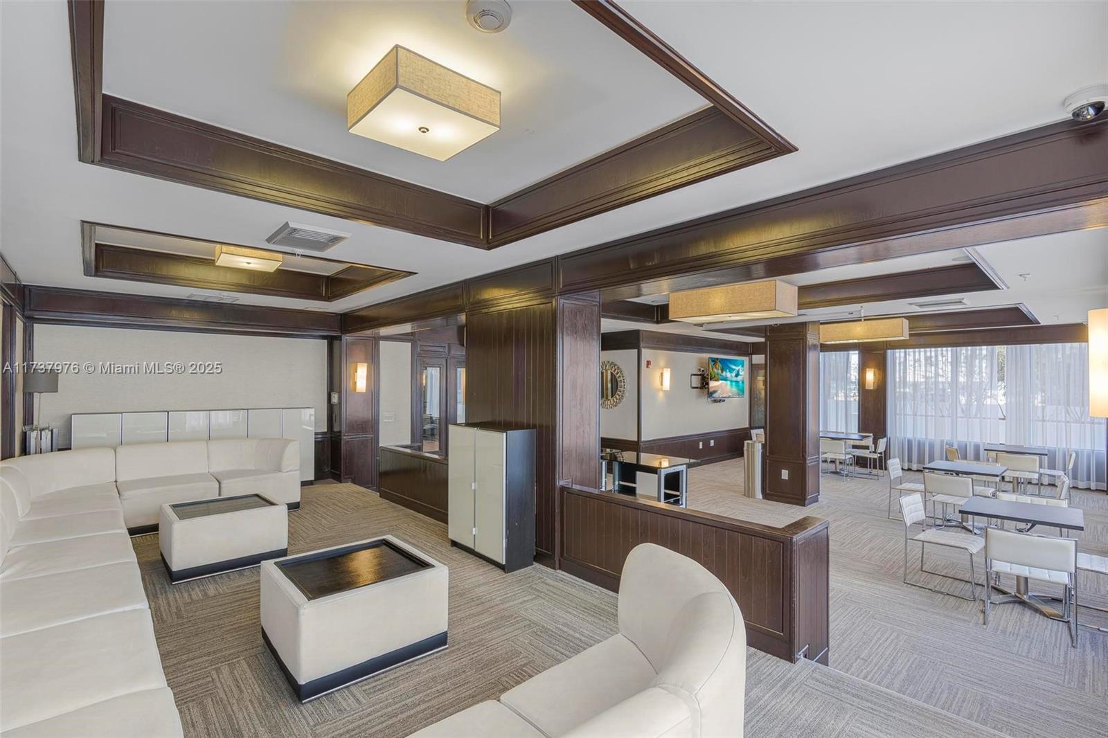 600 Northeast 36th Street, Unit 414 Miami, FL 33137 - Photo 42 of 51 a living room with furniture and view of kitchen