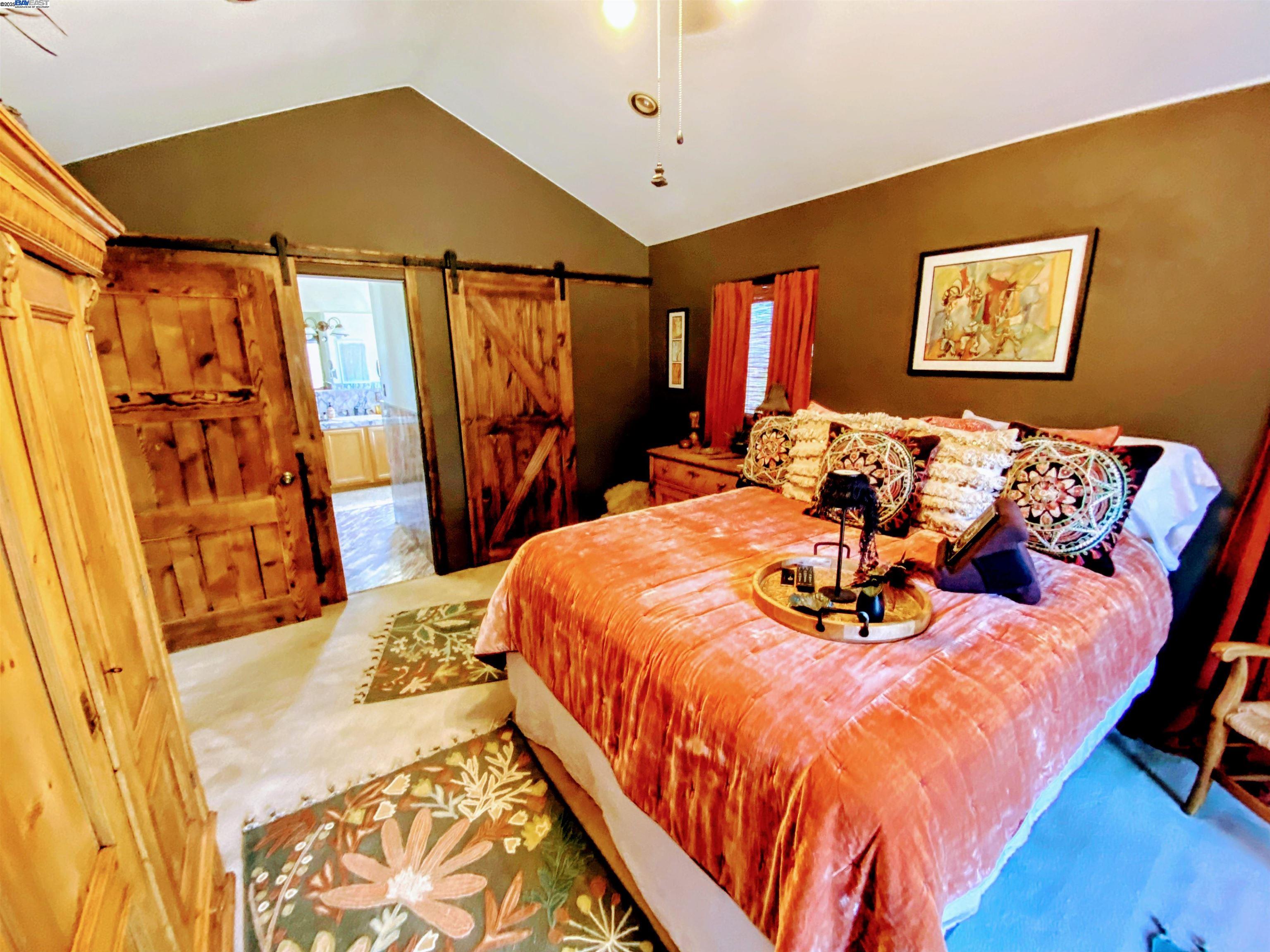 31733 Lake Meadow Road Acton, CA 93510 - Photo 7 of 24 a bed sitting in a bedroom next to a window