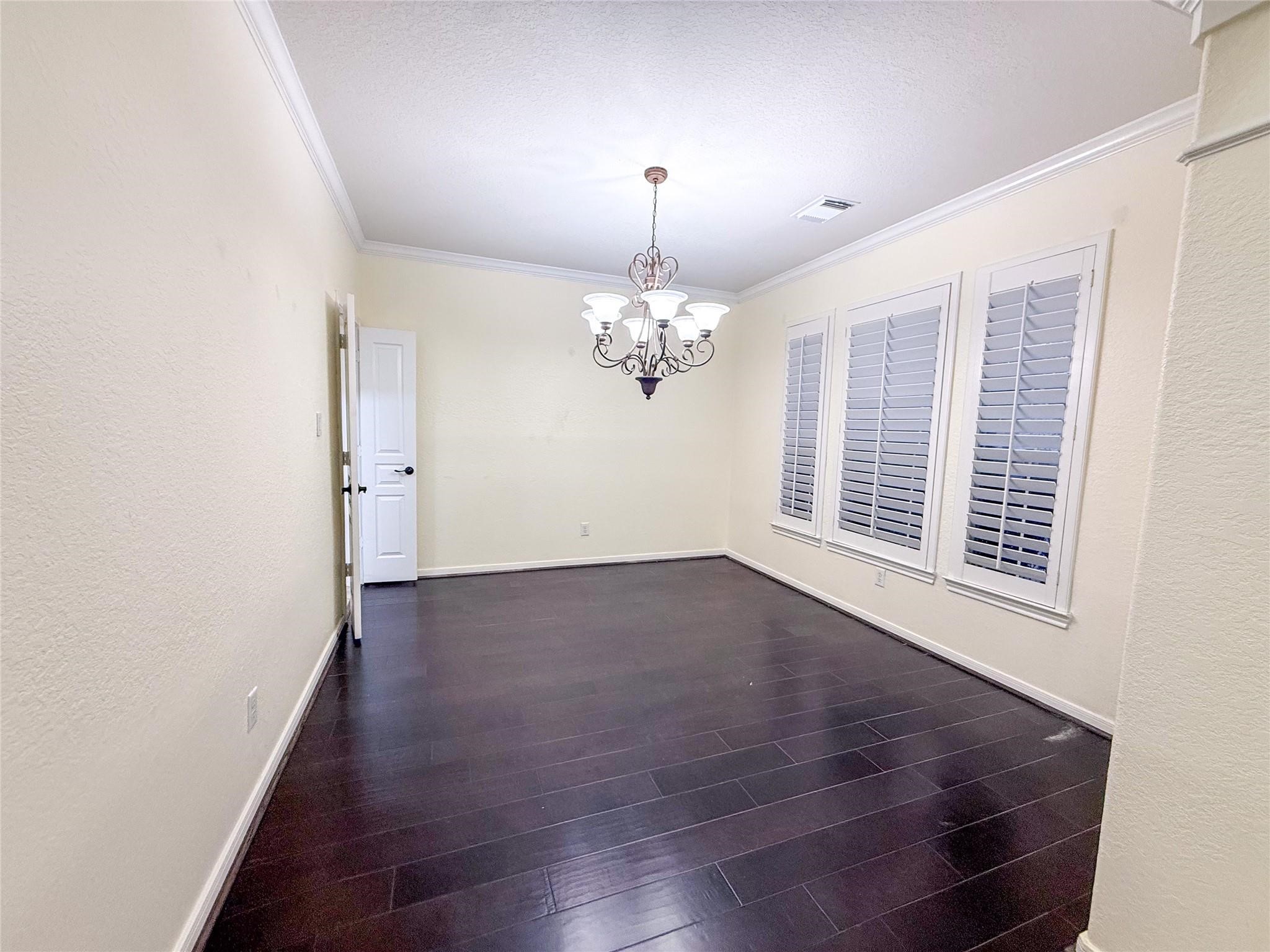 79 West Shale Creek Circle Spring, TX 77382 - Photo 15 of 29 wooden floor in an empty room with a window
