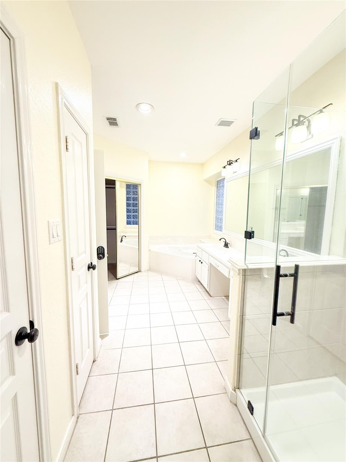 79 West Shale Creek Circle Spring, TX 77382 - Photo 21 of 29 a bathroom with a tub and a shower