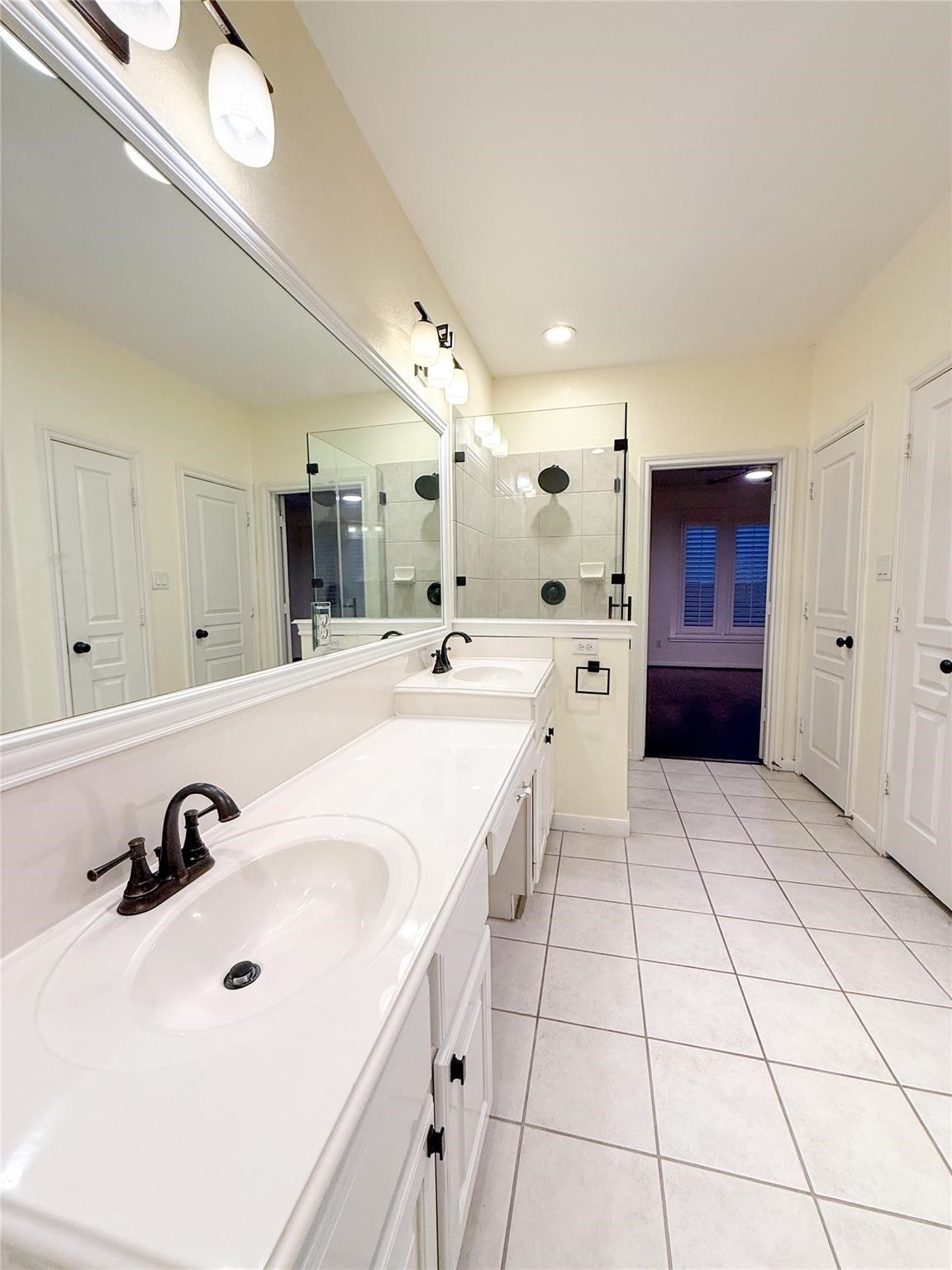 79 West Shale Creek Circle Spring, TX 77382 - Photo 23 of 29 a large white room with a white tub shower and sink