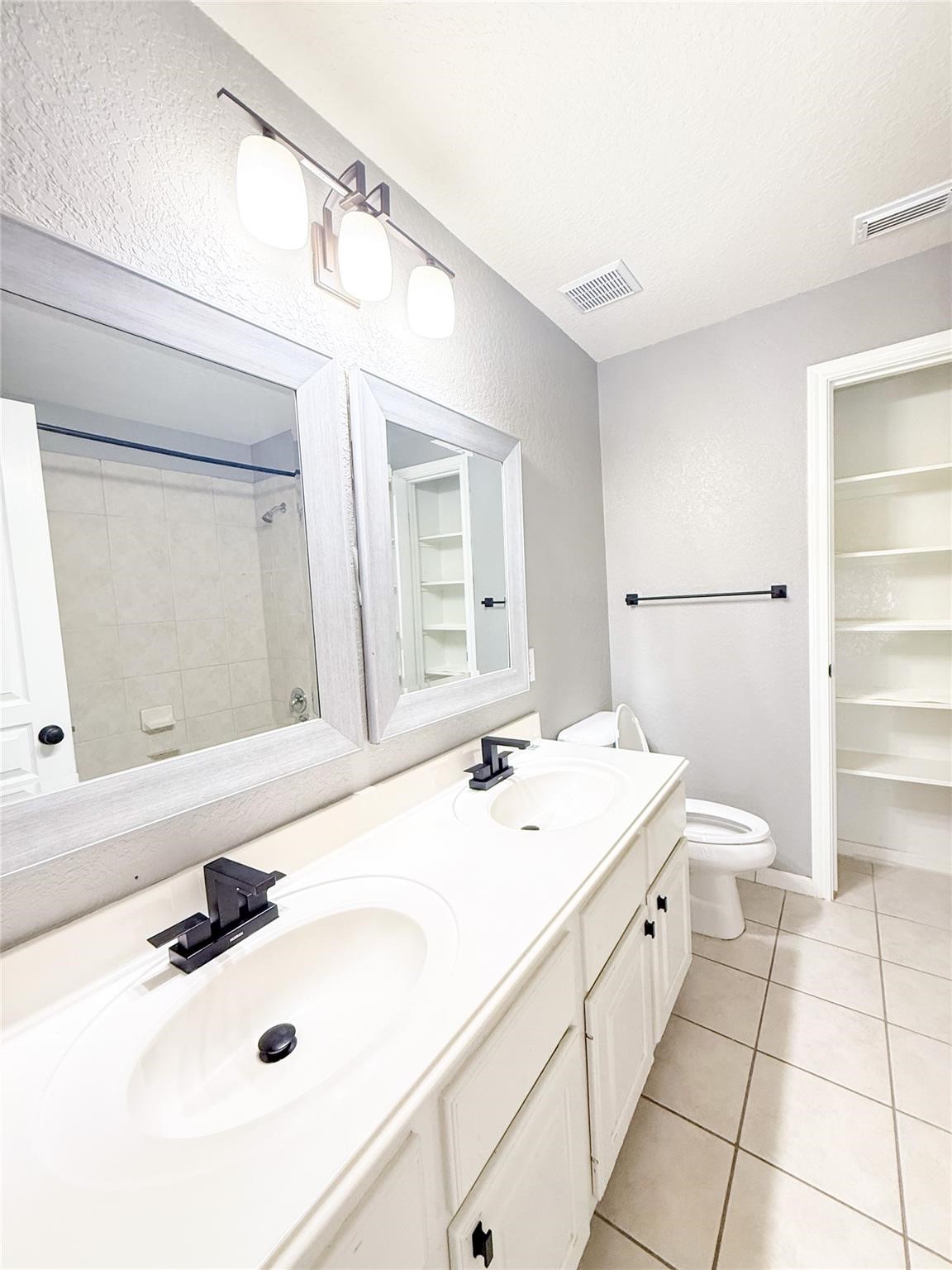 79 West Shale Creek Circle Spring, TX 77382 - Photo 28 of 29 a bathroom with a sink and a mirror
