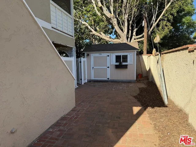 a house with trees in front of it